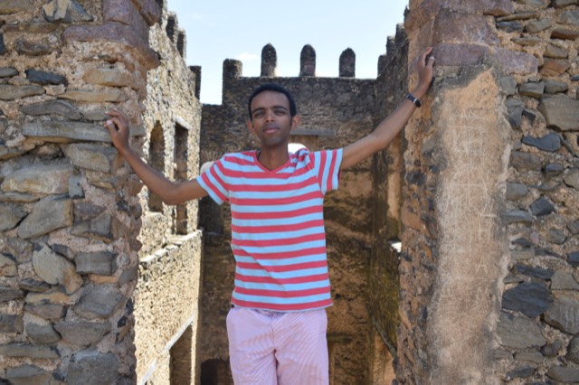 The crenellated stone walls and towers of the Fasil Ghebbi castle compound in Gondar
